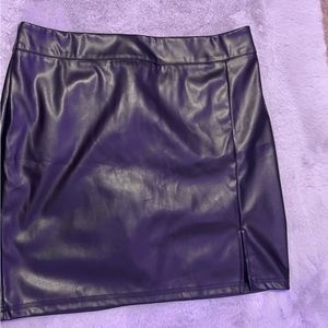 Black leather mini skirt